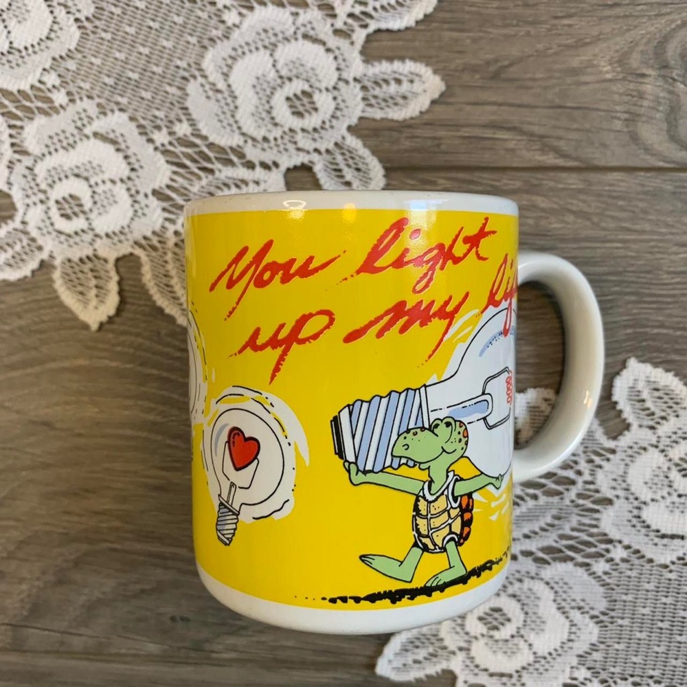 Vintage “You Light Up My Life” Lightbulb And Turtle Graphic Ceramic Mug.